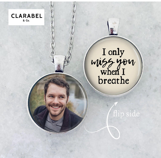 Custom photo sympathy pendant gift for grieving loved one. One side has a photo and the flip side has words, “I only miss you when I breathe.”